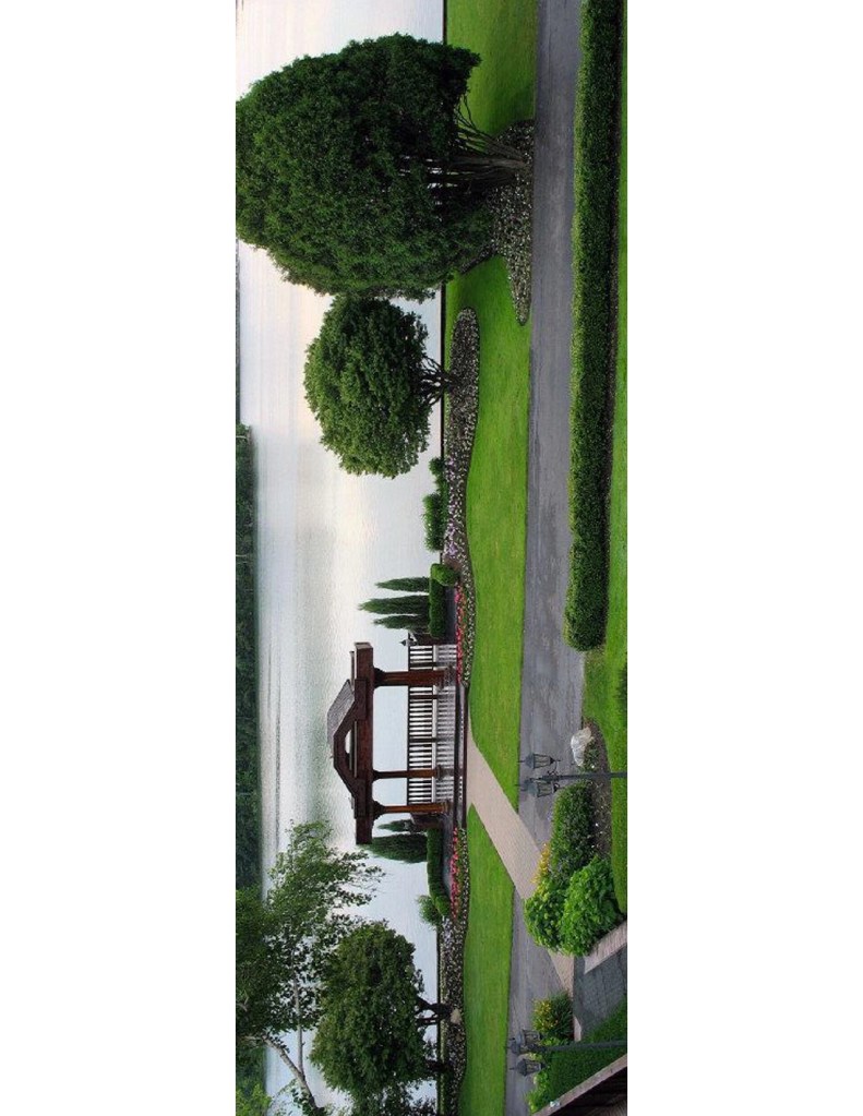 view of gazebo in front of golf course pond